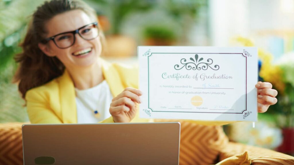 woman with graduation certificate
